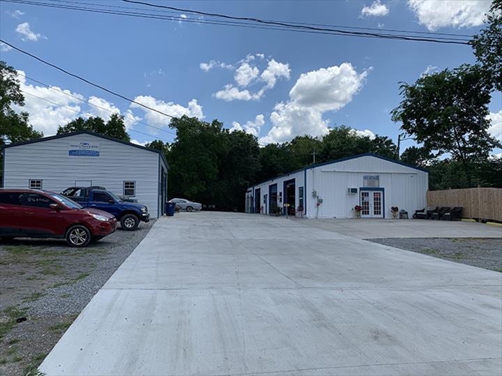 Daniel's Paint & Body Shop Wrecker Service Auto Body Shop